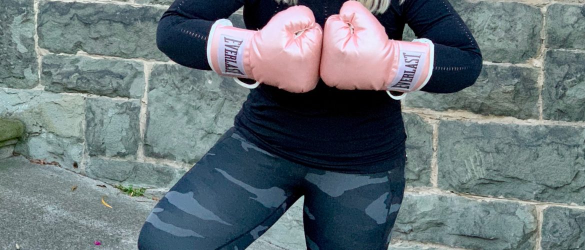 Jacqueline wearing Athleta Outfit and Everlast Boxing Gloves