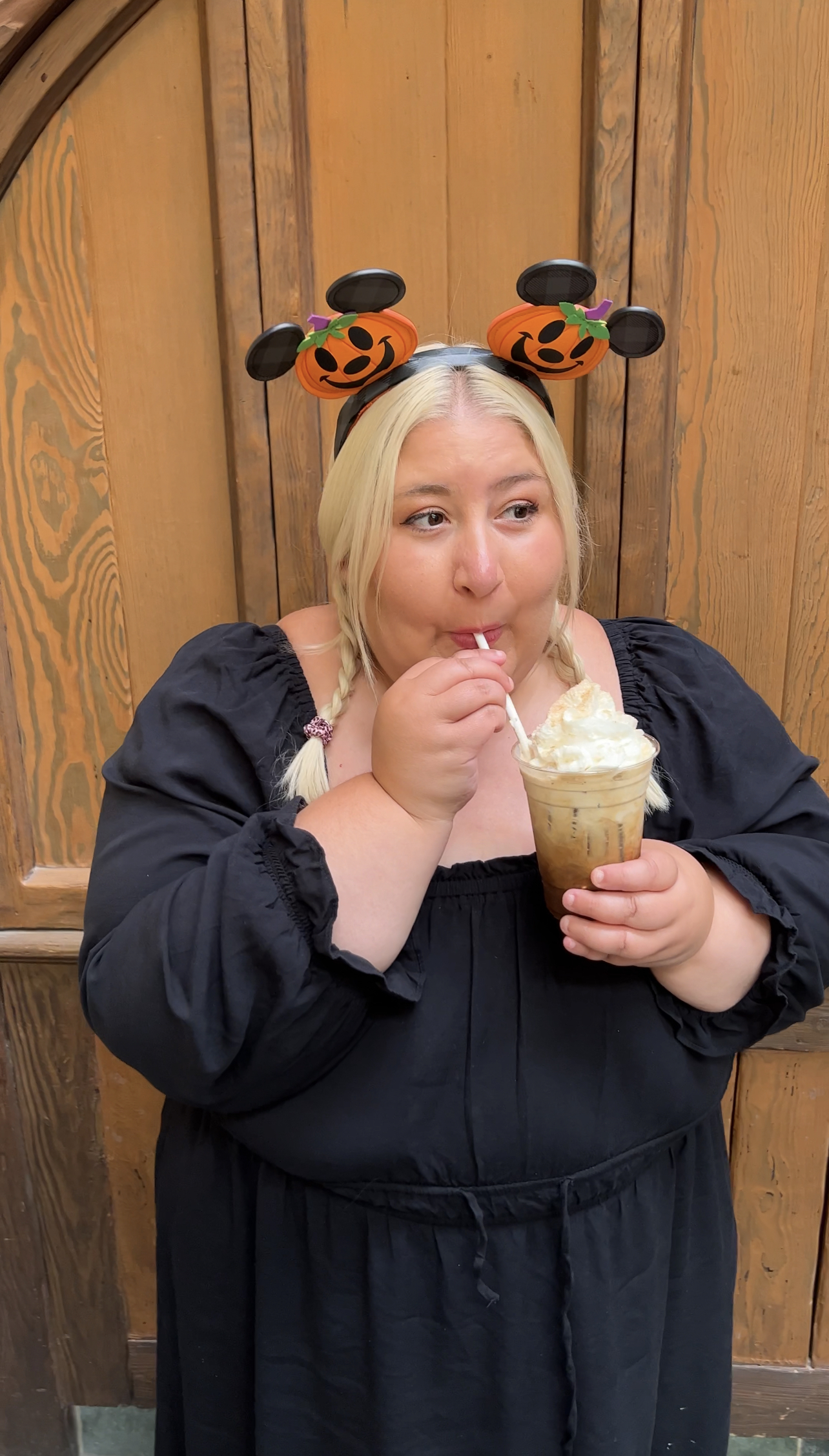 Jacqueline Trying Pumpkin Cold Brew Disneyland Halloween 2022